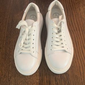 White Wishbone by Brown’s sneaker.